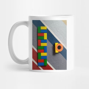 Colorful building blocks on carpet 1 Mug